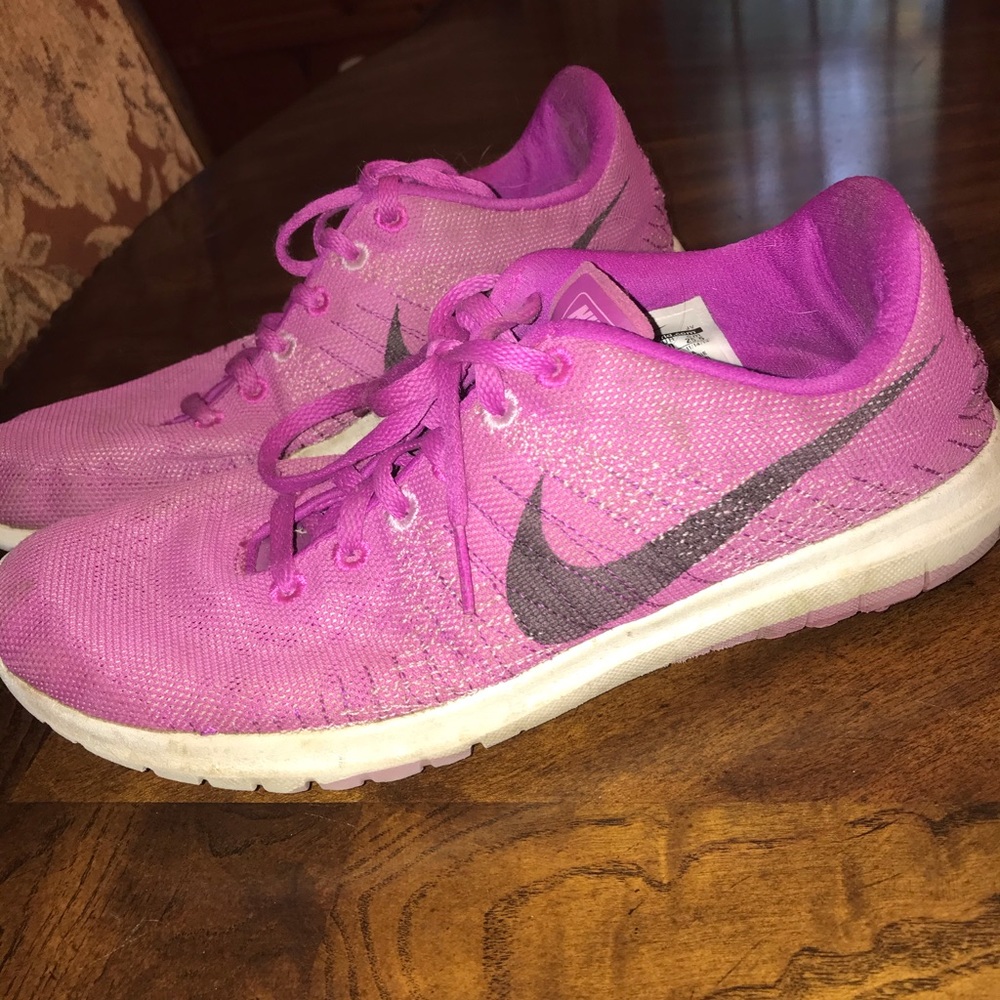 Violet color Nike athletic shoes